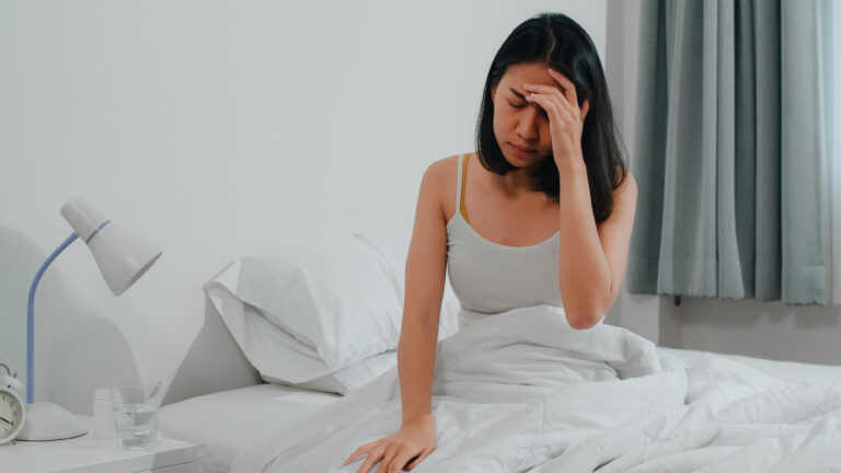 Unhealthy sick Indian female suffers from insomnia